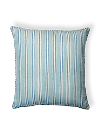 Striped blue pillow on a white background