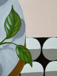 Close-up of a plant with a geometric pattern in the background