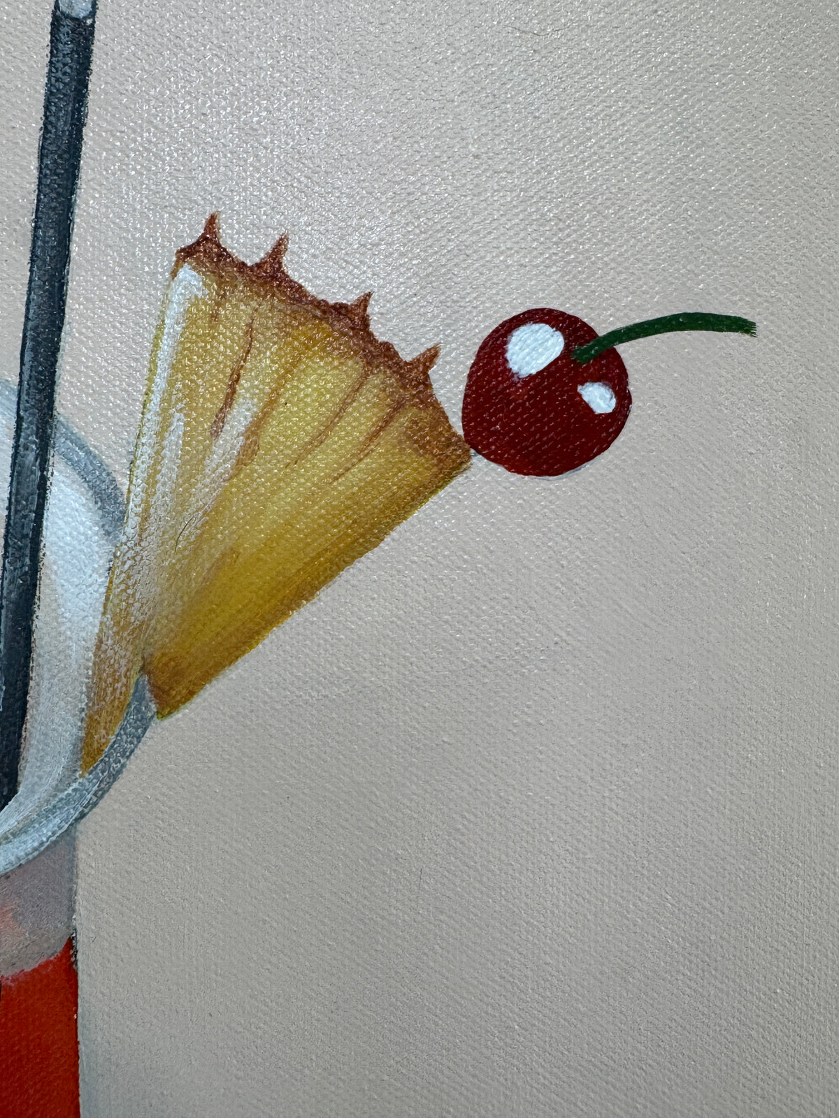 Close-up of a straw with a cherry on top against a neutral background