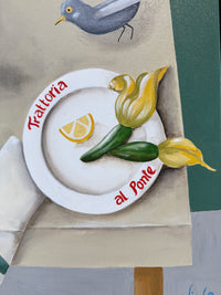 Decorative towel with a plate design featuring vegetables and a bird, branded 'Trattoria al Ponte'.