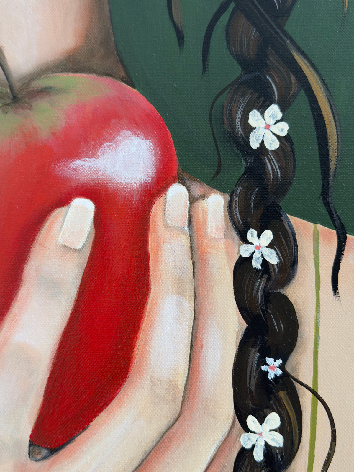 Artistic depiction of a hand with red lips and braided hair adorned with flowers.